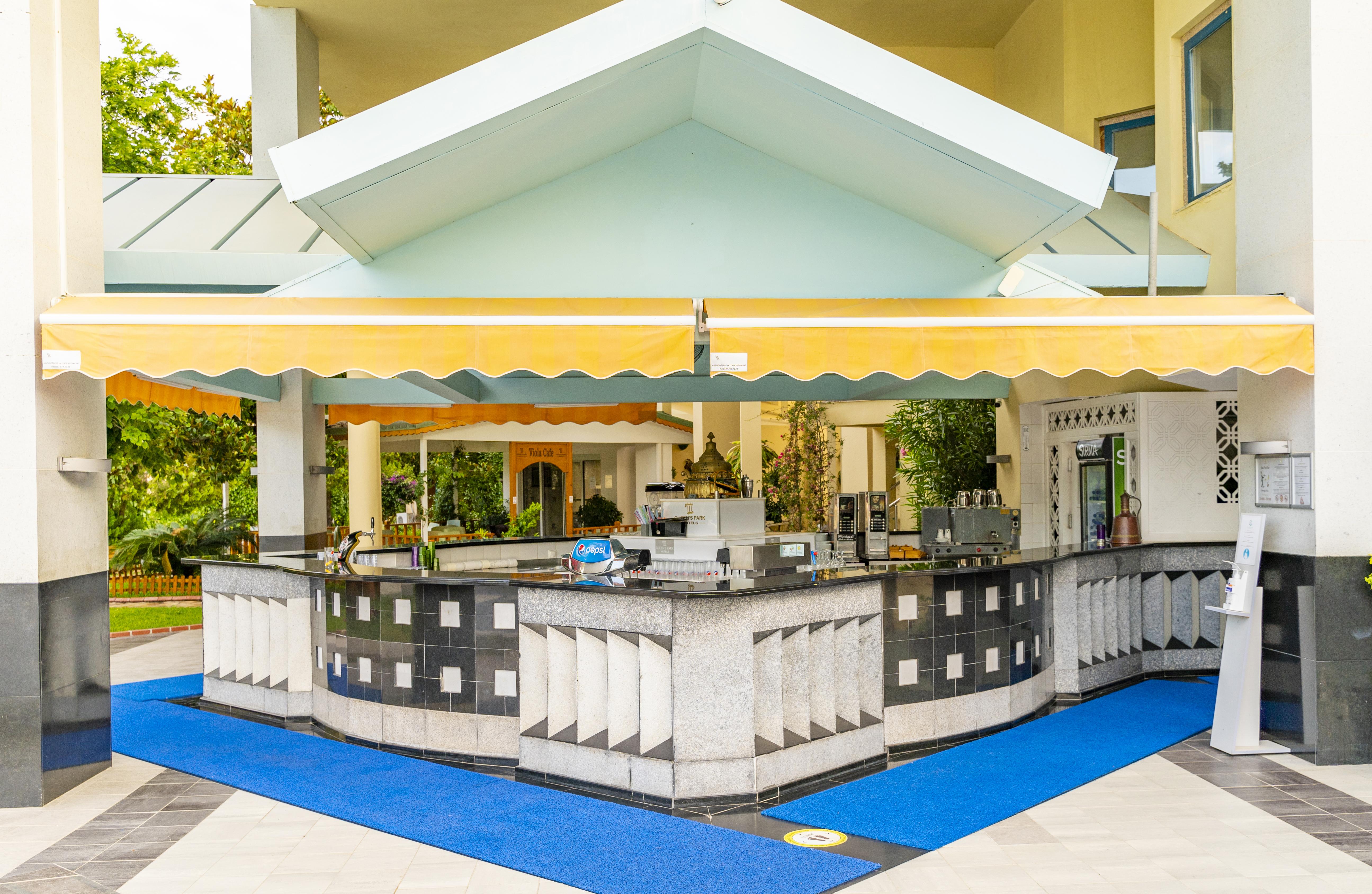 Queen'S Park Le Jardin Kemer Bagian luar foto